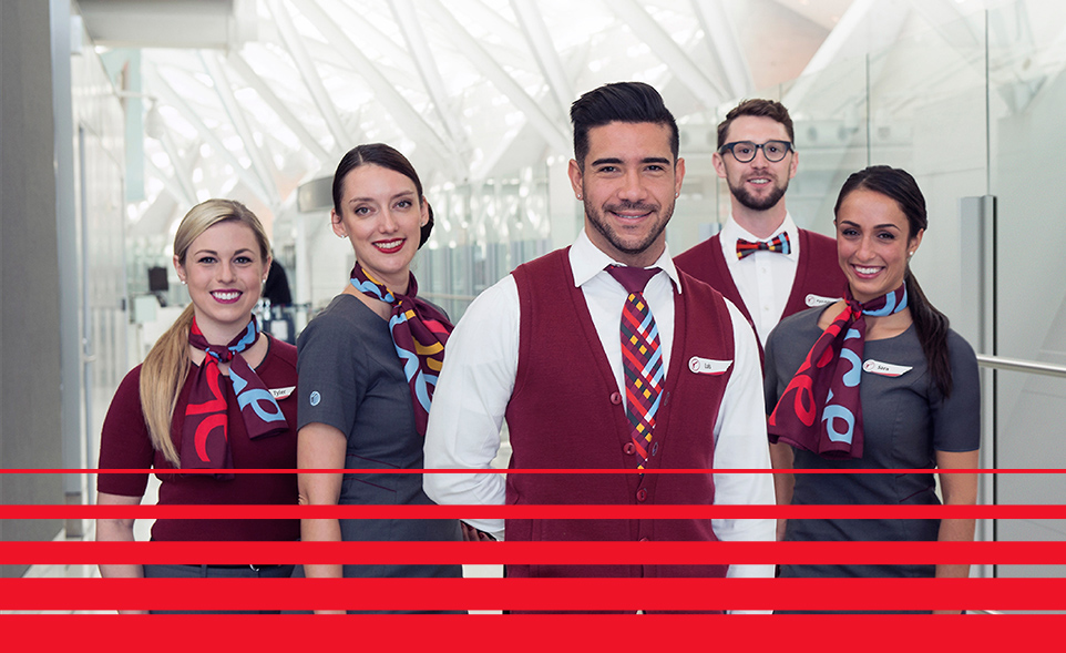 Rouge flight attendant performing an annoucement.