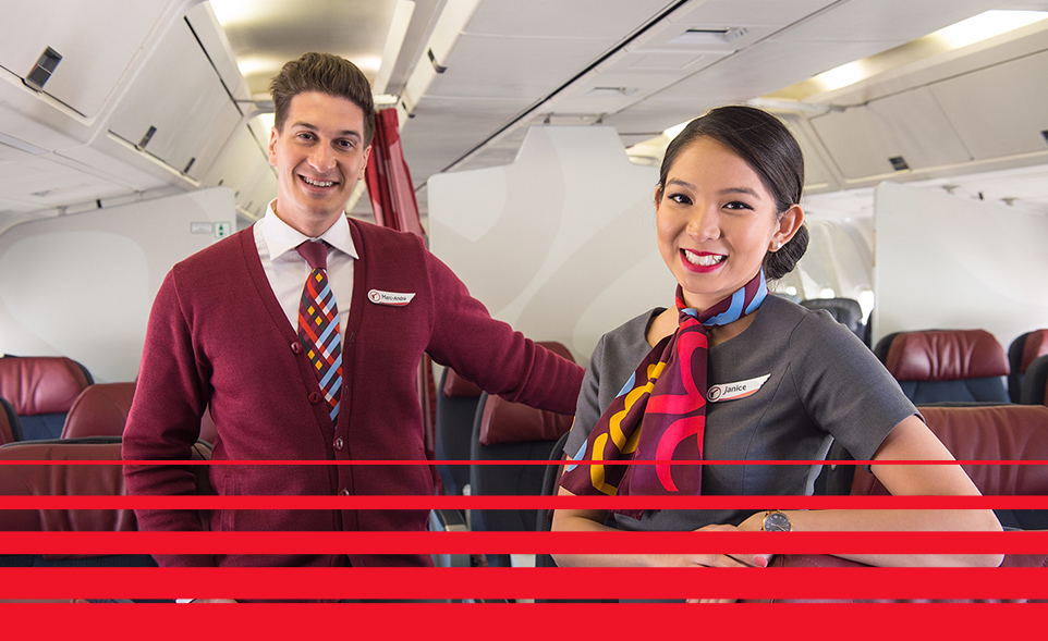Two female Rouge Flight Attendants posing.